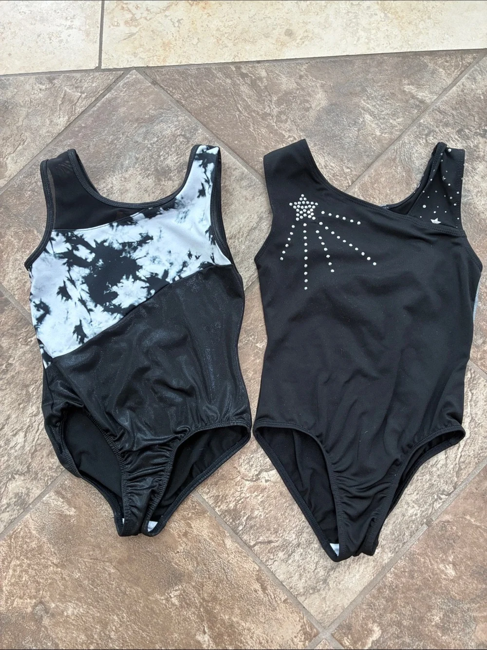 More than Magic set of two gymnastics/dance leotards with matching shorts.